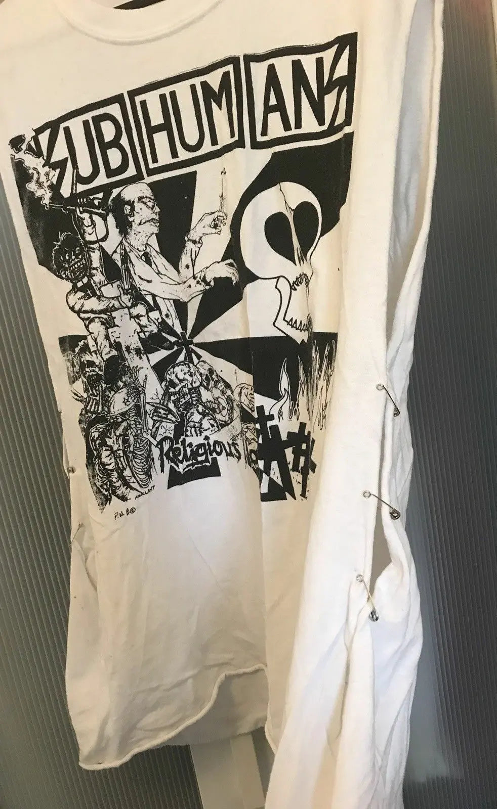 DIY homemade punk tshirt, size L unisex. Safety pins running down each side. Unbranded