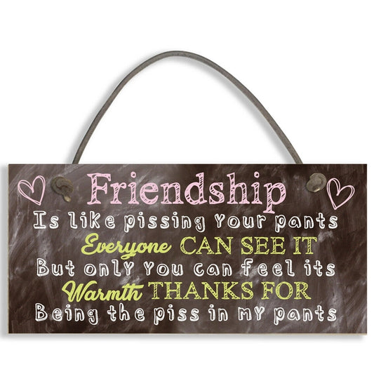"Friendship is like pissing your pants" sign Wonkey Donkey Bazaar