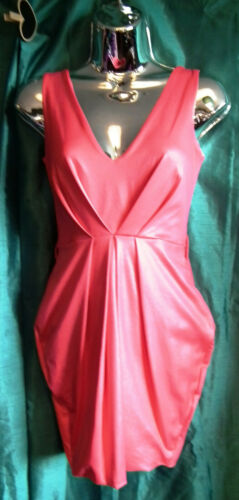 New coral stretchy,sexy,kneelength WEDDING/PROm puff hemdress .size10BUST 36" none