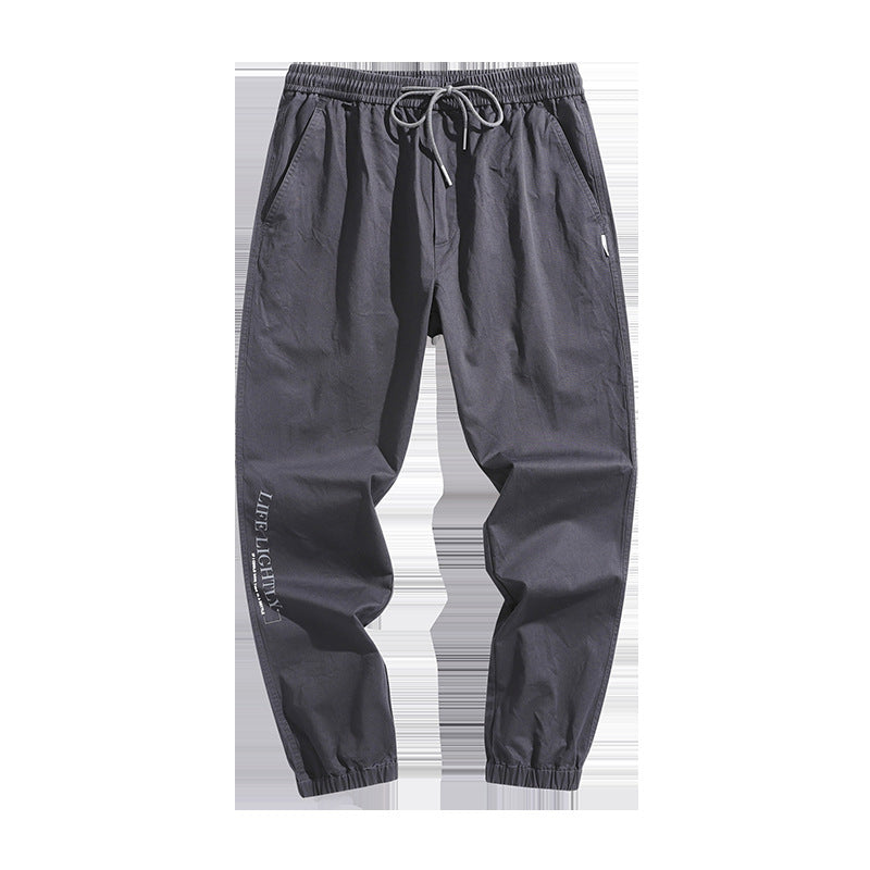 Work wear pants: Men's new Korean style trend, pure color, loose and thin, drawstring, elastic waist, casual pants FashionExpress