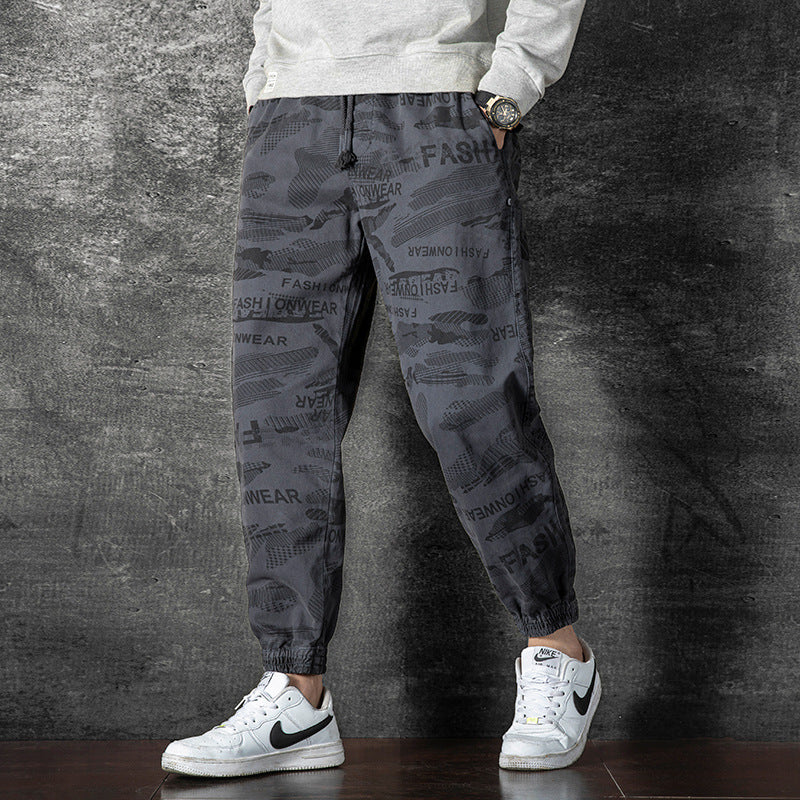 Camouflage overalls Pants: Men's seasonal trend, versatile, thin elastic belt, foot binding, handsome sports and leisure pants FashionExpress