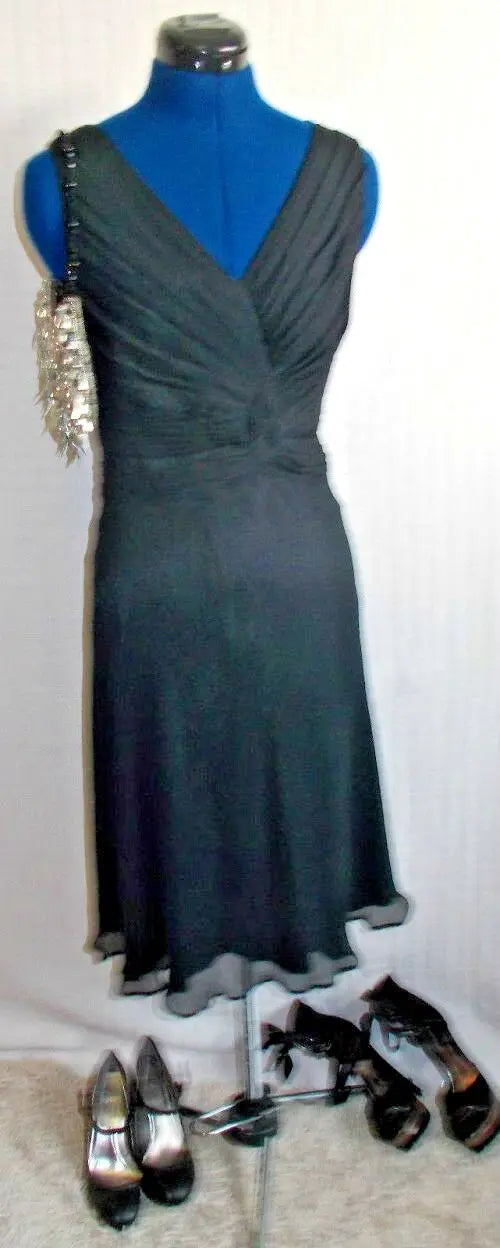 black Teatro occasion dress.size 8, lined, ruffled waist, floaty skirt sleeveles Teatro