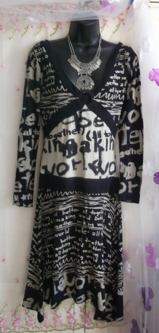 Statement-Dress-By-Desigual-World a better place. long sleeve.plunging neckline and back. Stunning. black & white slogans Wonkey Donkey Bazaar