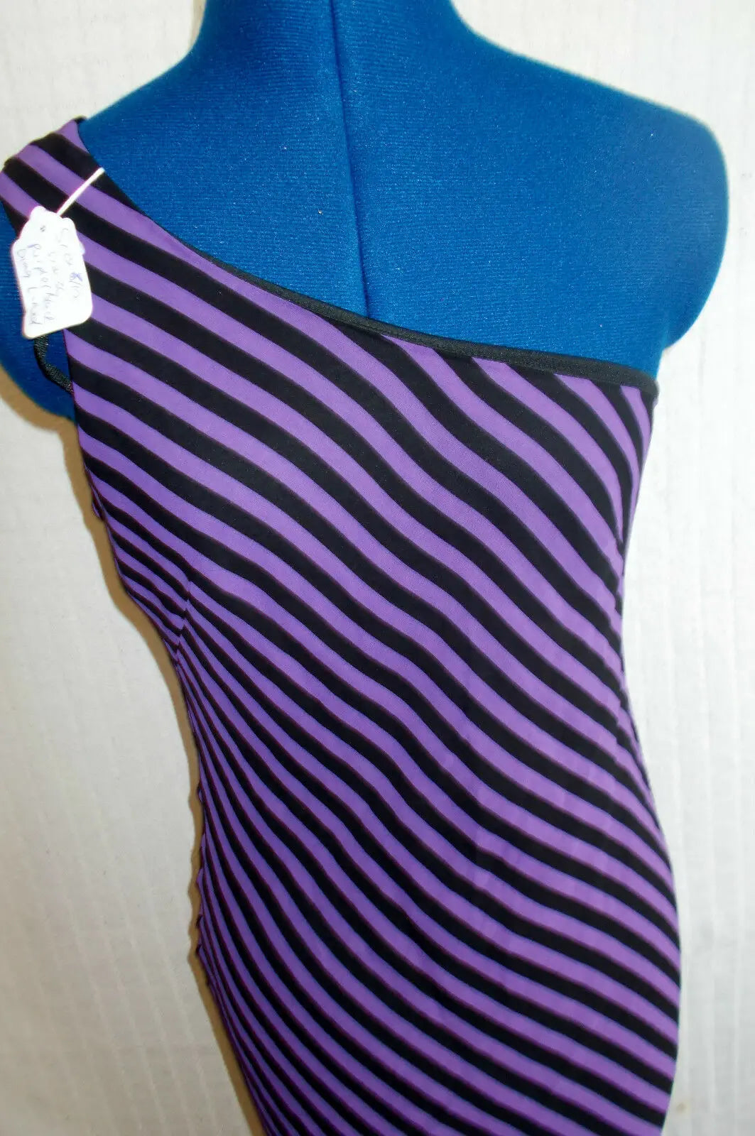 unusual purple/black stripe off shoulder diag cut dress, lined. size 8/10 (36. Unbranded