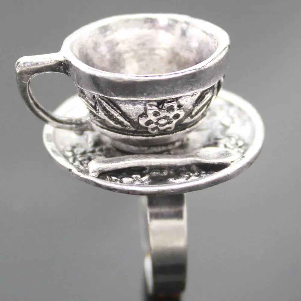 unusually funky Alice In Wonderland Silver Hatter Tea Cup Party RING UO Unbranded